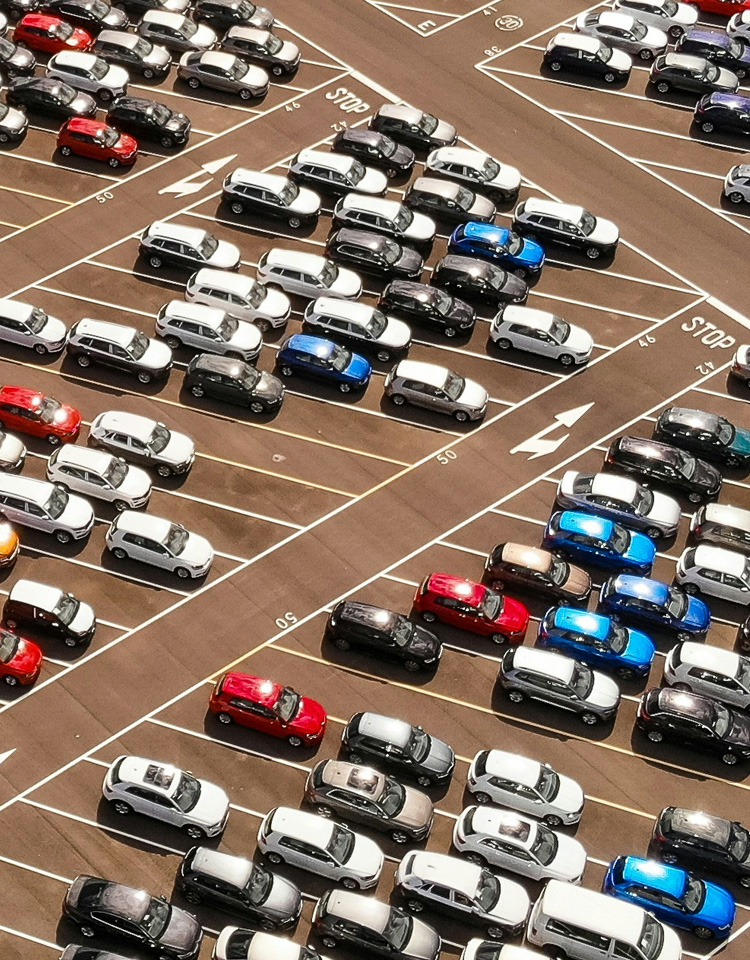 Many vehicles in a parking lot